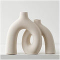 Sculptural ceramic donut vase set