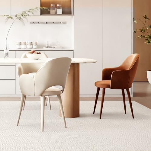 Wool area rug styled in a neutral bedroom