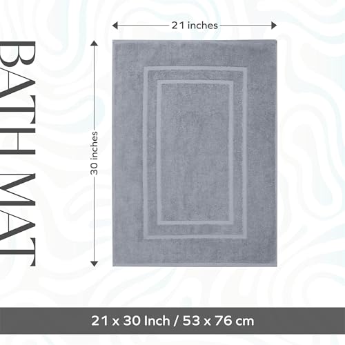 Cotton bath mat styled in bathroom