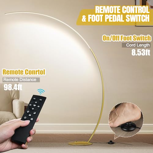 Brass arc floor lamp with warm dimmable light on