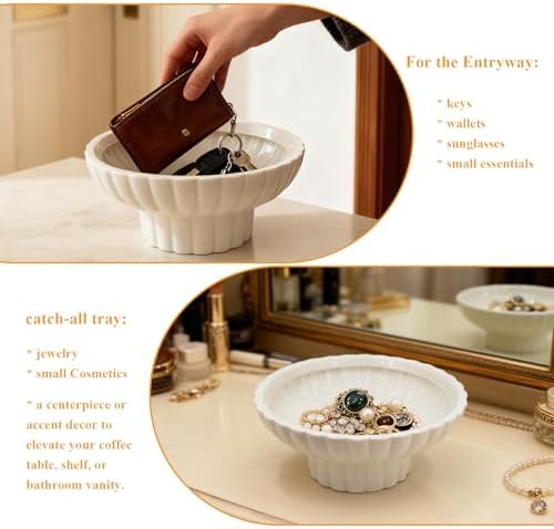 Ceramic pedestal bowl holding keys and jewelry