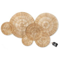 Set of six woven jute wall baskets arranged in a cluster