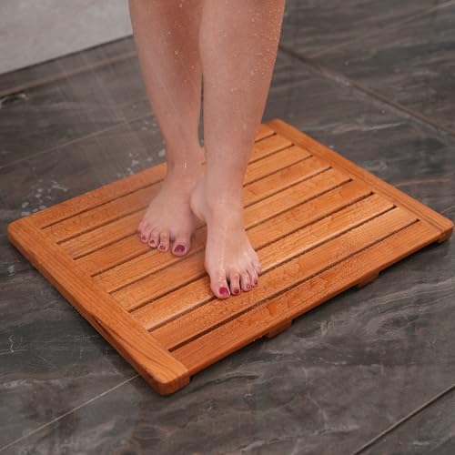 Teak bath mat in use on shower floor