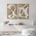 Framed abstract canvas art styled on a living room wall