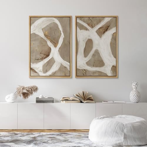 Framed abstract canvas art styled on a living room wall