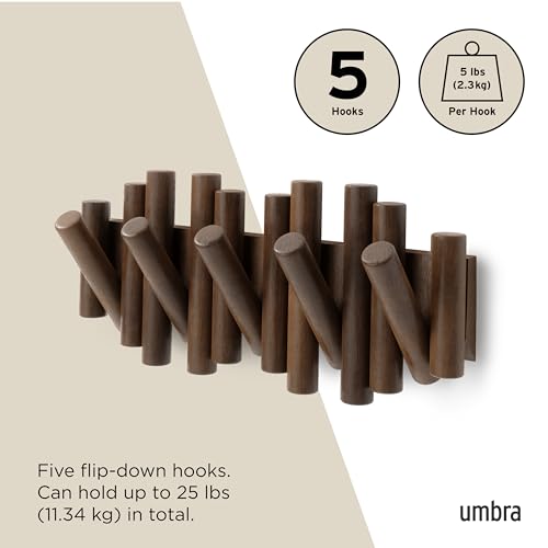 Umbra Picket walnut wall hook rack holding bag and towel