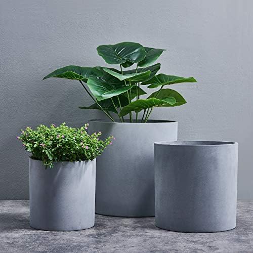 Fiberstone planter styled with a statement floor plant