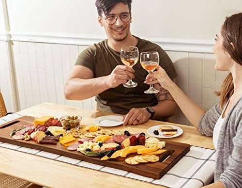 Acacia serving board styled on a dining table