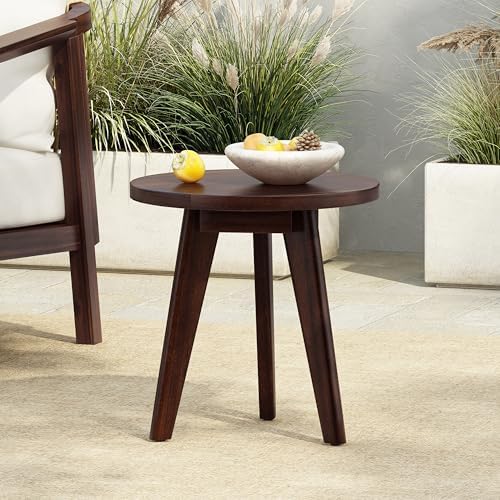 Close-up of angled wood legs on outdoor side table