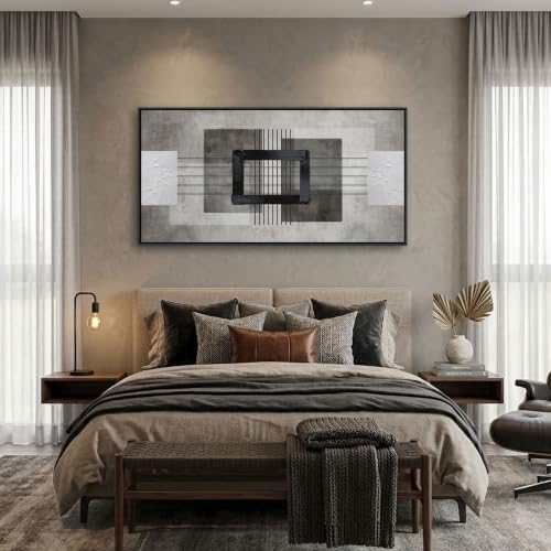 Abstract canvas wall art styled above a sofa