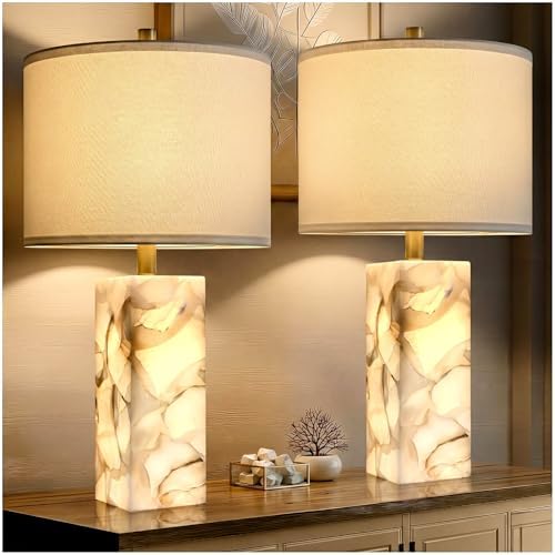 Alabaster table lamps styled as a pair on nightstands