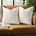 Textured stripe outdoor pillow covers styled on a sofa