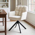 Cream velvet swivel desk chair styled in a home office