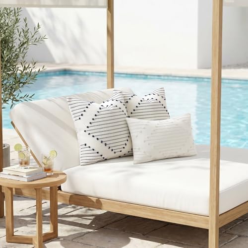 Set of two outdoor pillow covers folded together