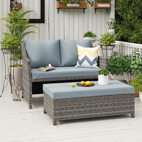 Gray wicker loveseat with storage coffee table on patio