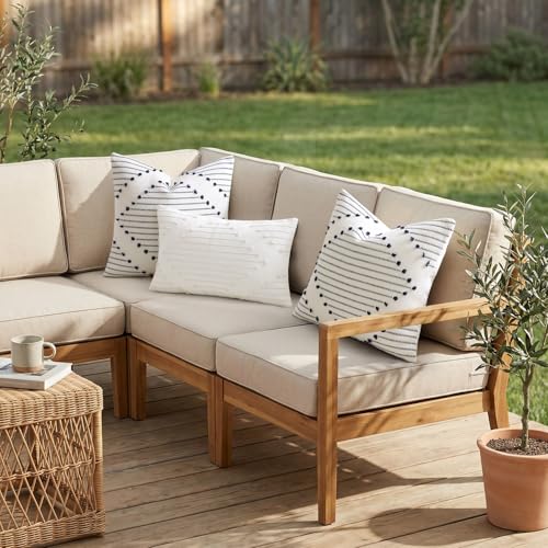 Beige and cream outdoor pillow covers on a patio chair