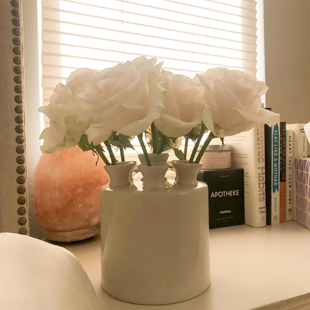 Tulip ceramic vase styled on an entryway console