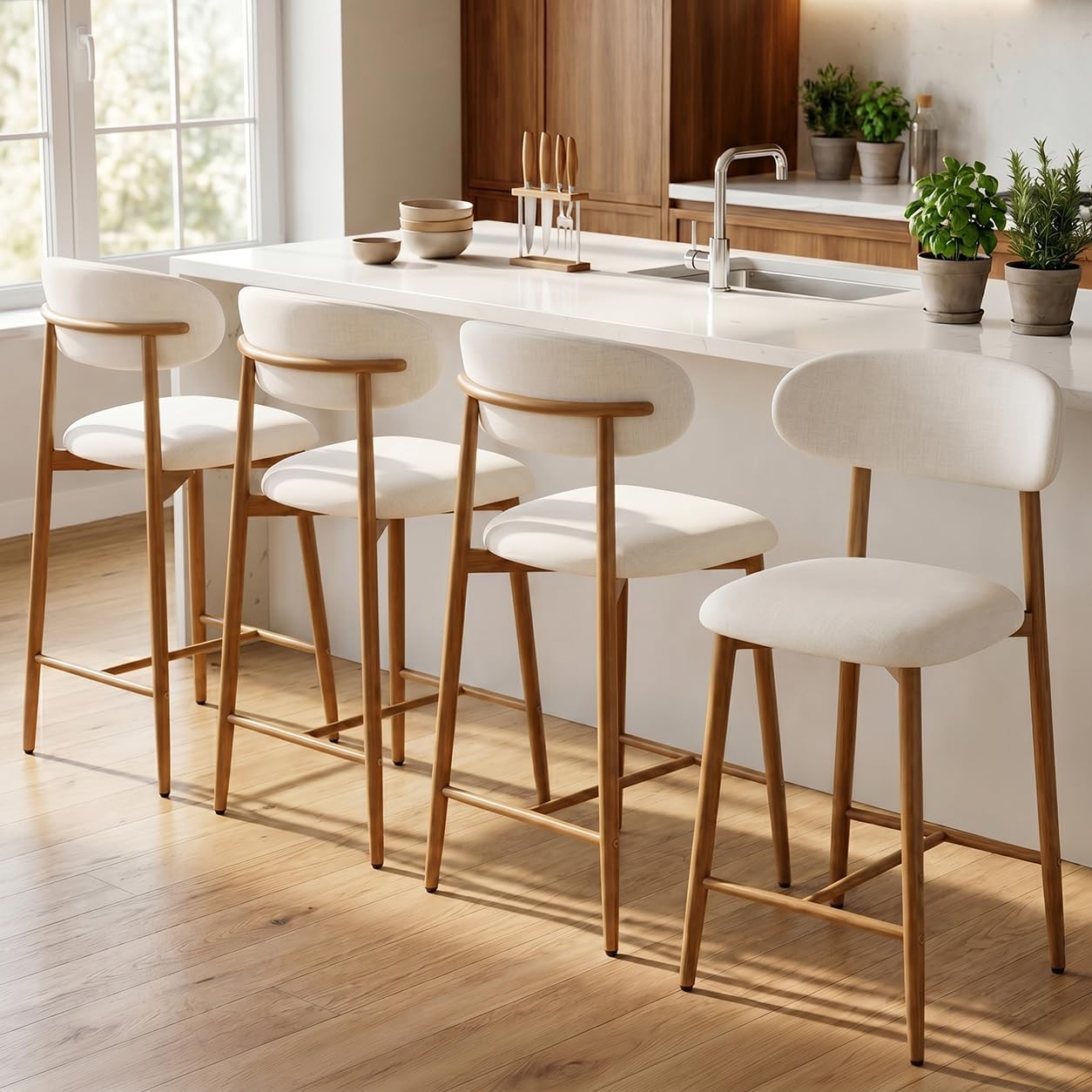 Counter height upholstered bar stools styled at a kitchen island