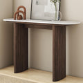 Modern fluted console table with sintered stone top on a plain background