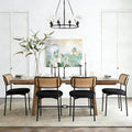 Modern rattan dining chairs styled around a dining table
