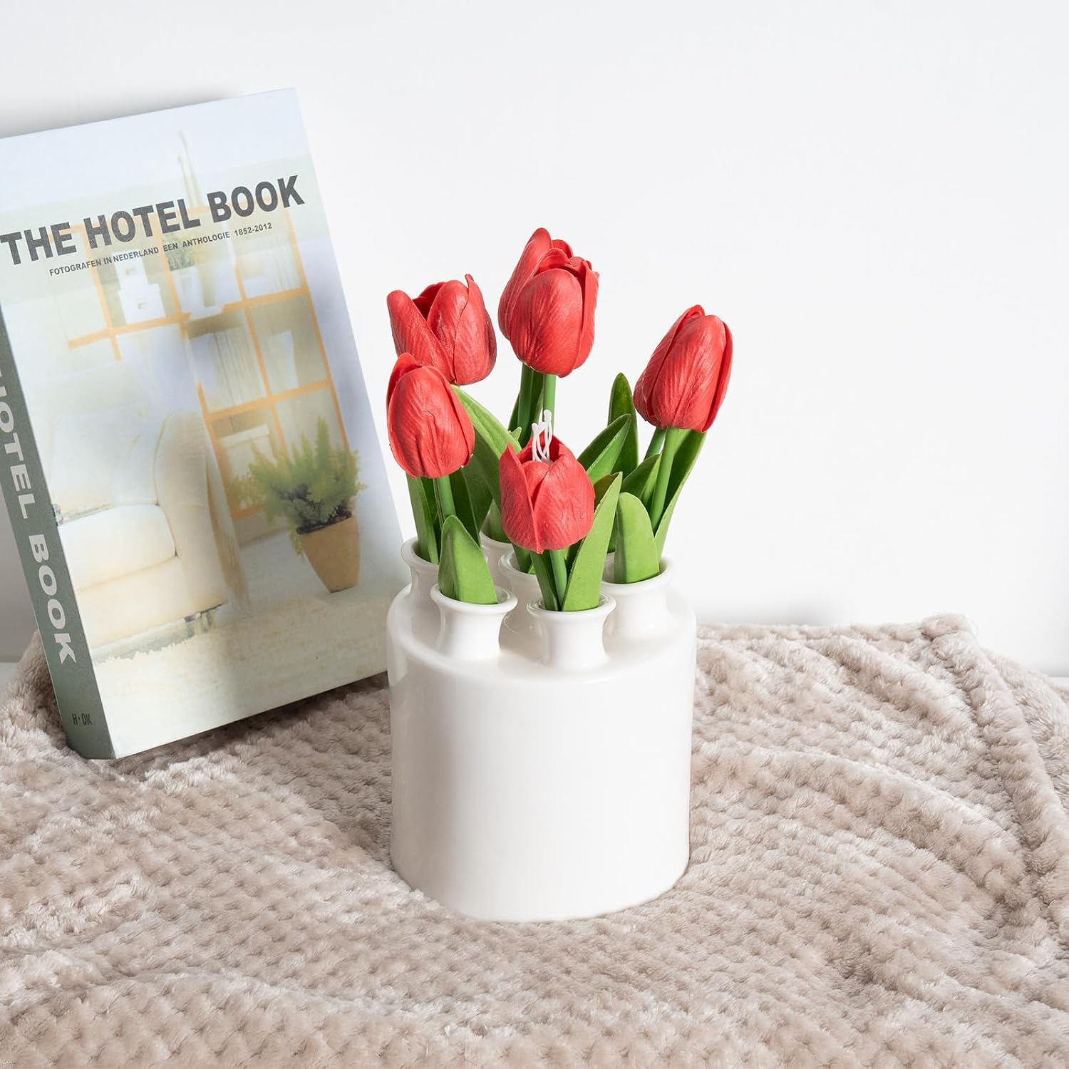 Tulip ceramic vase styled with fresh tulips on a table