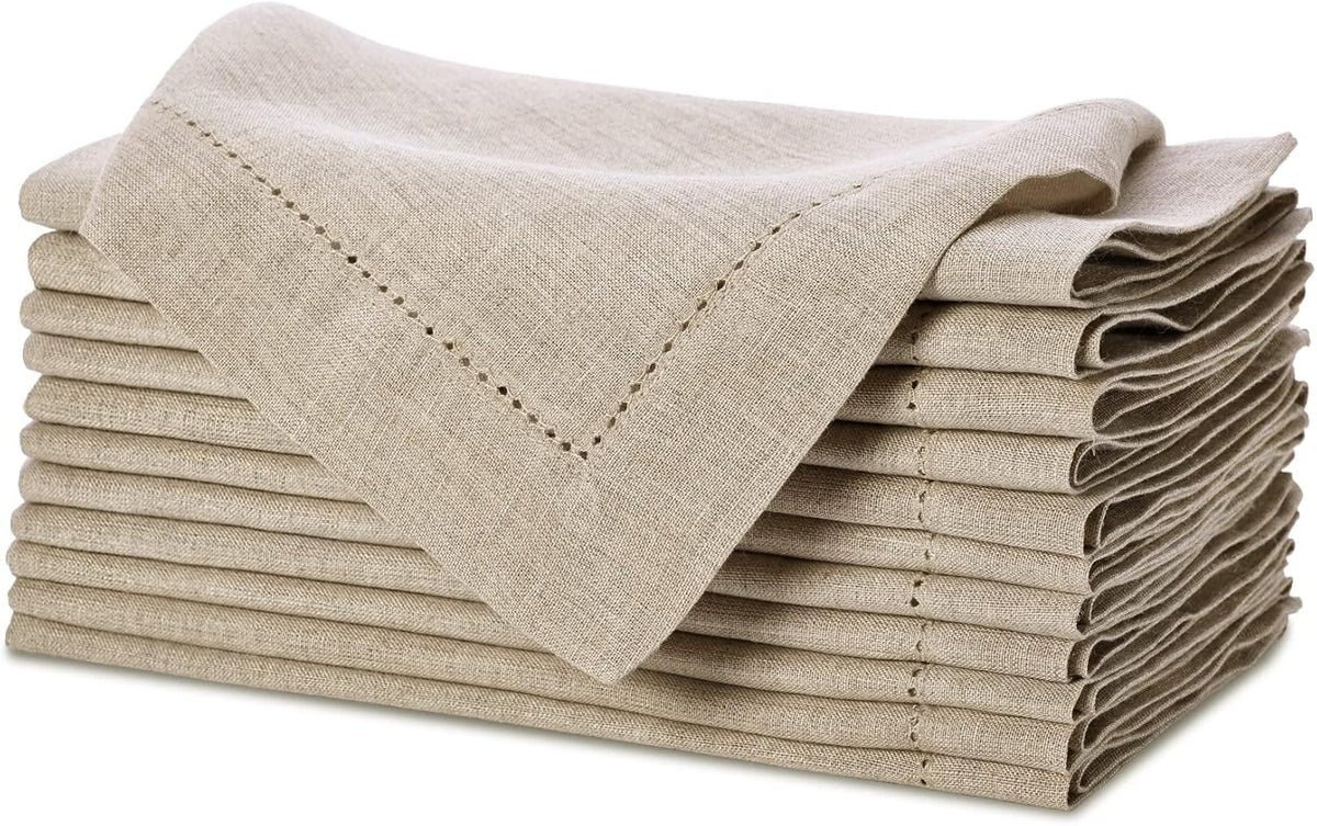 Stack of natural linen hemstitch napkins