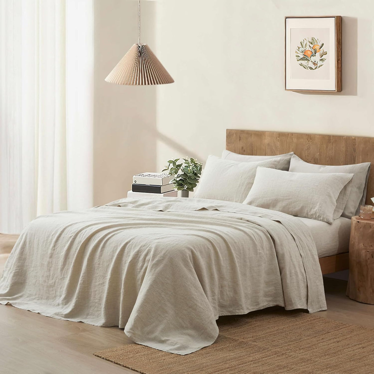 Relaxed linen sheets in an airy neutral bedroom