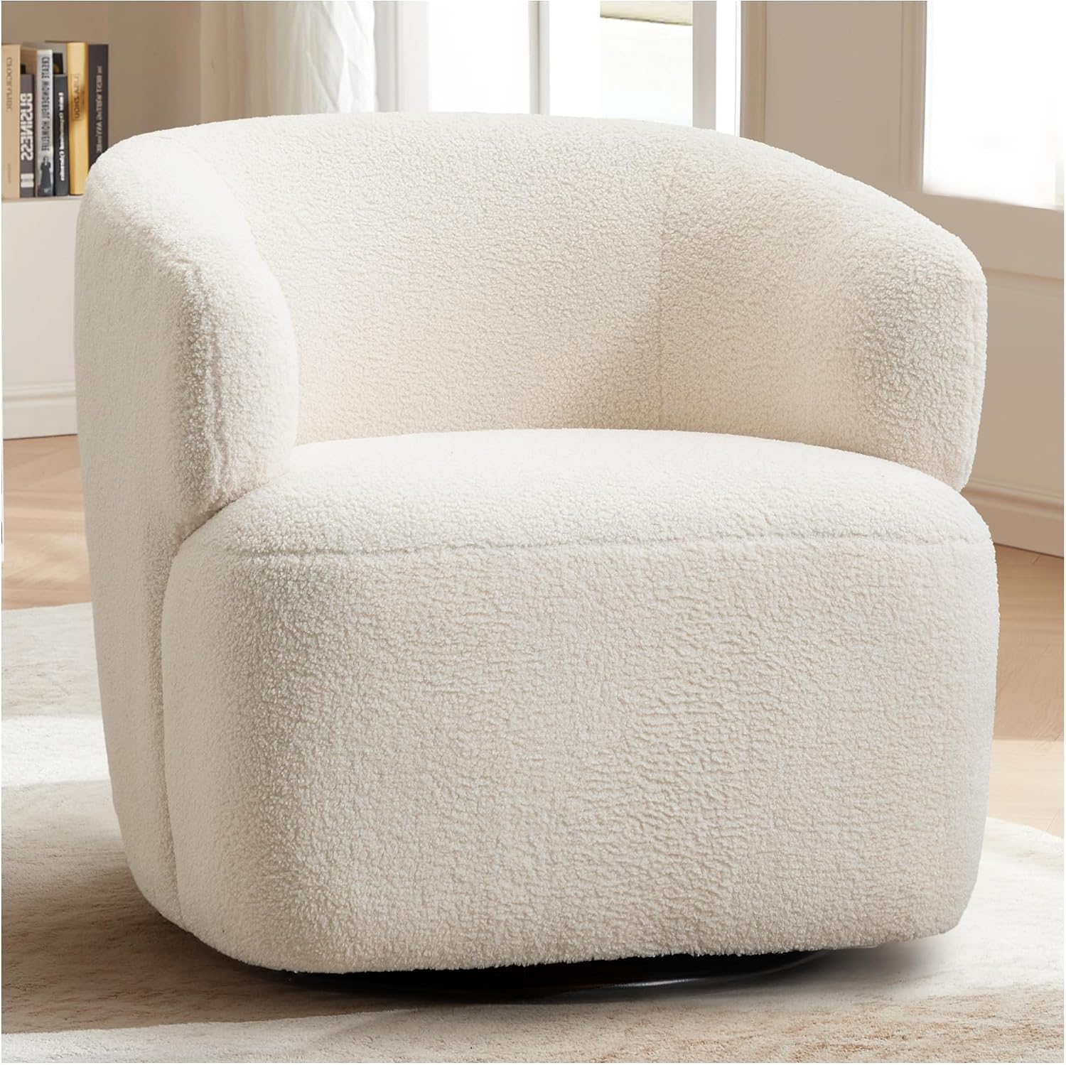 Boucle swivel barrel chair in a living room