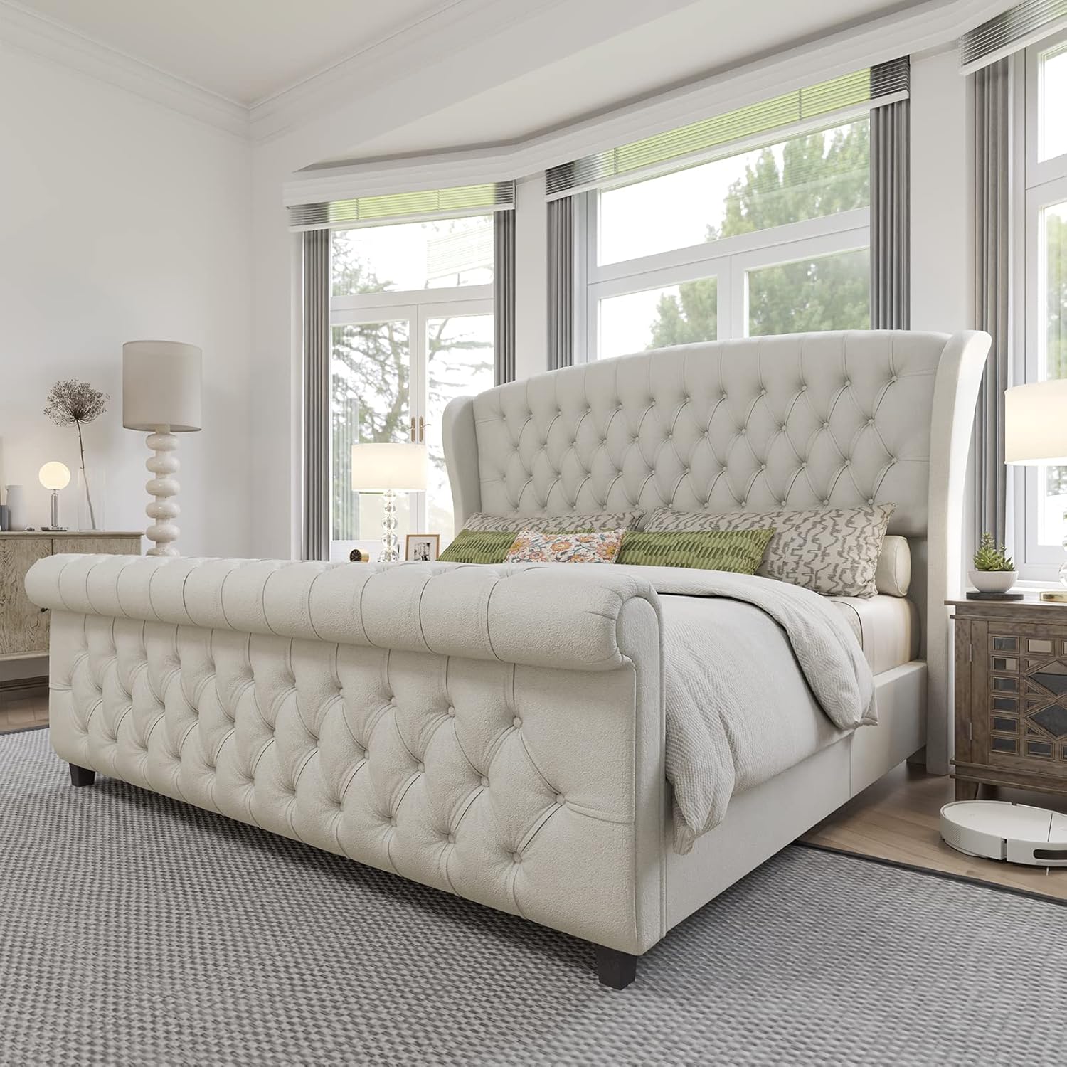 Tufted upholstered sleigh bed styled in a bedroom