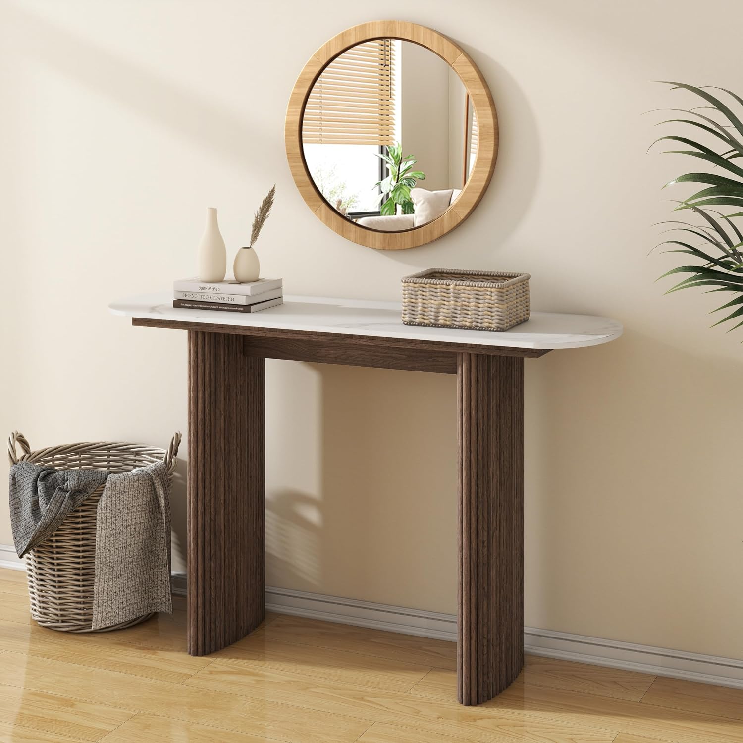 Console table styled in a living room with wall art